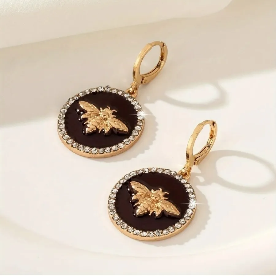 گوشواره زرشکی و طلایی
